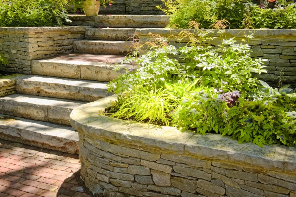 Multi level stone retaining walls by retaining walls company ashburton Retaining Walls Ashburton with strong garden support and clean structure