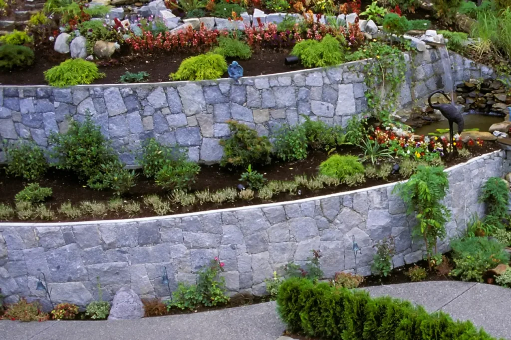 Stone garden wall and steps built by retaining walls company ashburton Retaining Walls Ashburton showing stable support and clean design