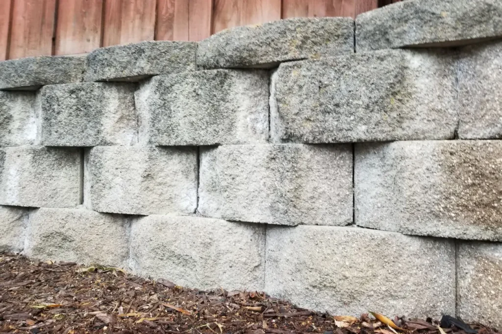 Stone retaining wall built by the best retaining walls company in ashburton Retaining Walls Ashburton showing durable stacked stones for yard support
