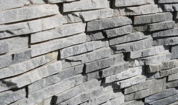 Stone Walls Christchurch stacked grey stone wall showing clean layers for stone walls services Christchurch